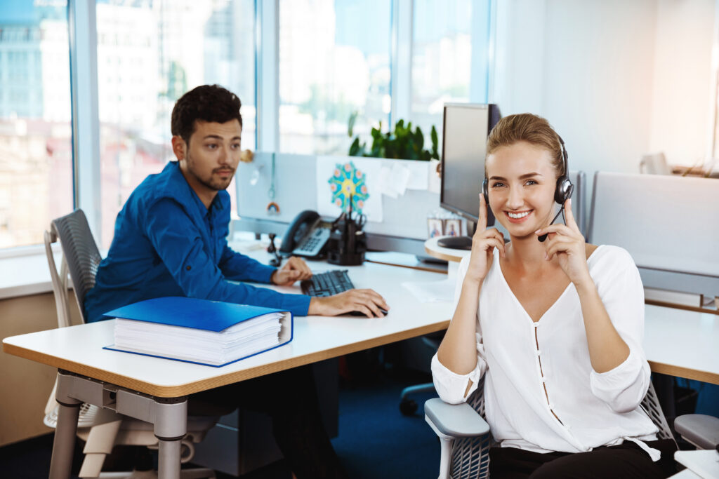 Business professional reviewing National DNC compliance rules for outbound calling and telemarketing.